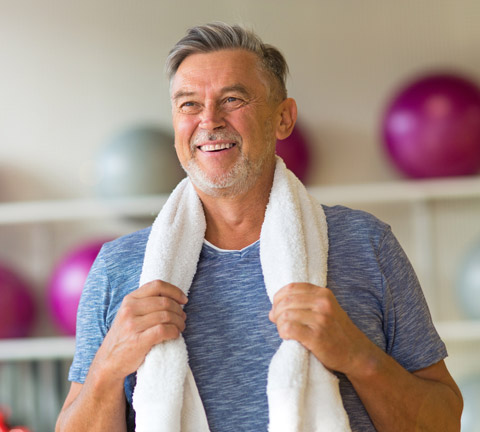 older man resting after workout